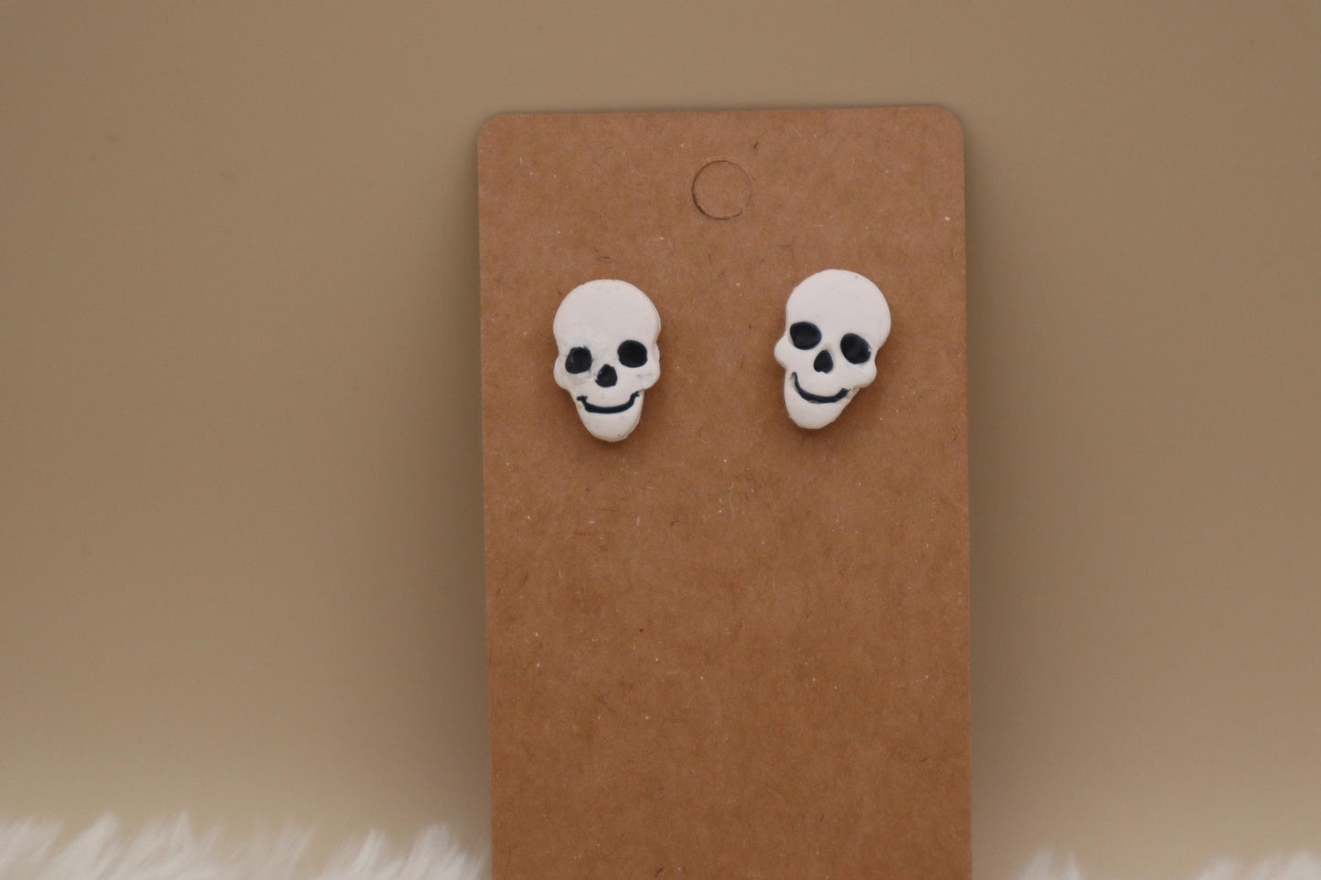 Clay Smiling Skull Stud Earrings