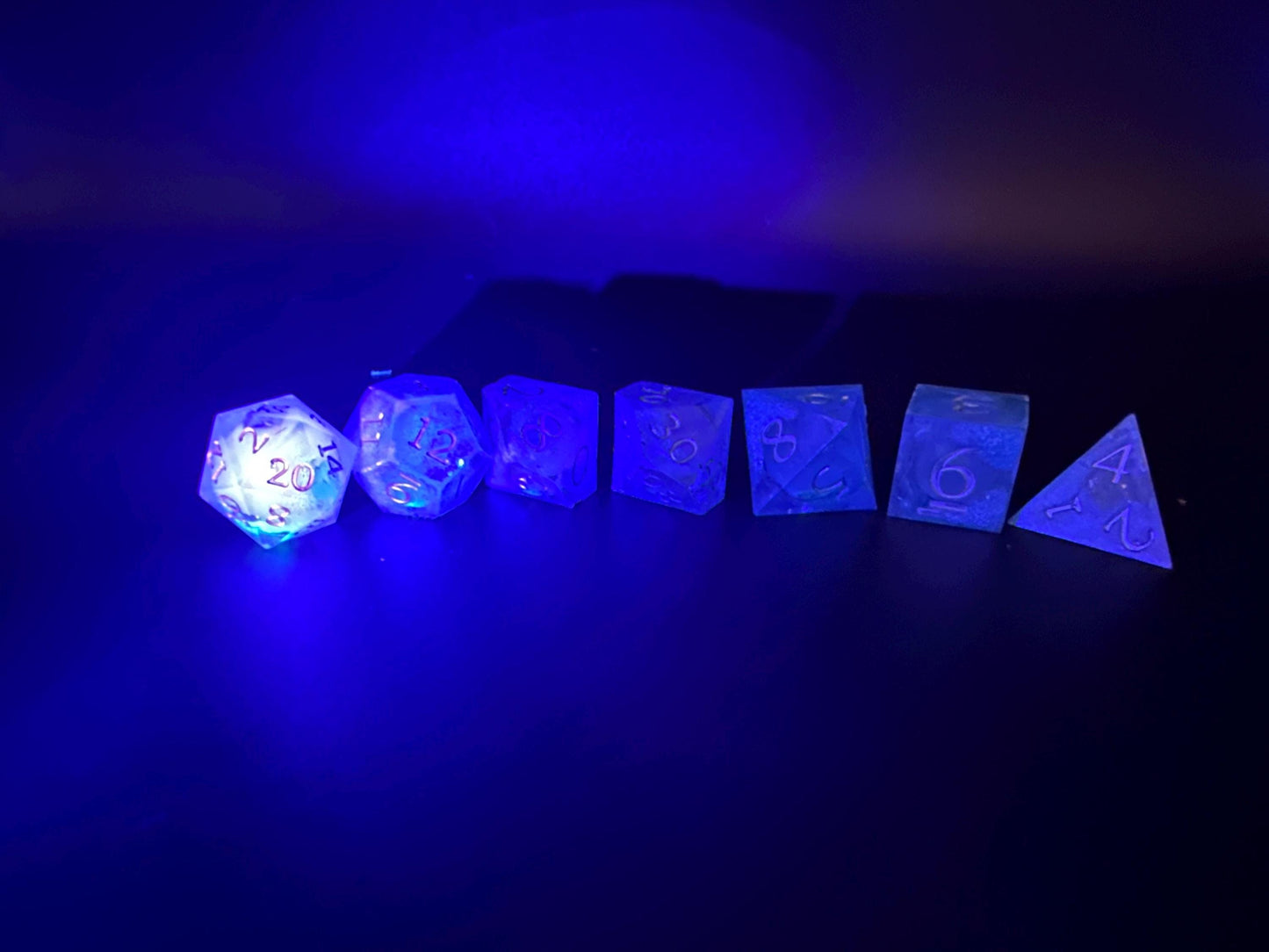 Blue UV Reactive Liquid Core Dice Set: Sharp Edge Polyhedral DnD Dice